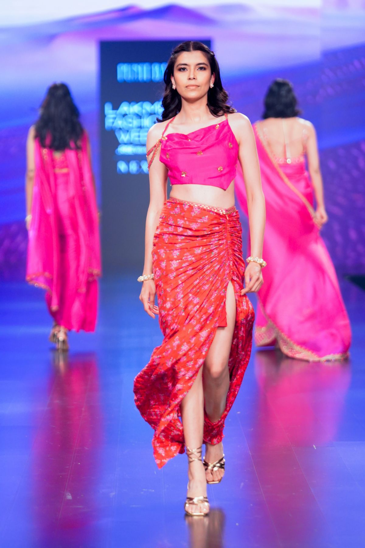 Surkh Laal Floral Draped Skirt Paired With Gulaabi Gulaal Asymmetric Top
