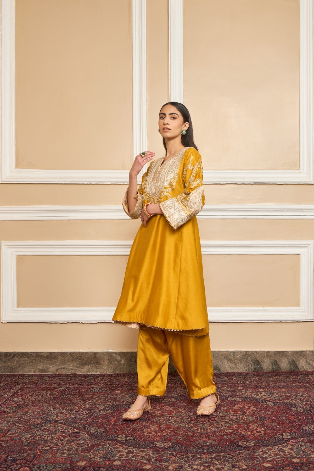 Shraddha Gurung in Mohsina - Glaze Mustard Short Kalidaar Choga with Salwar