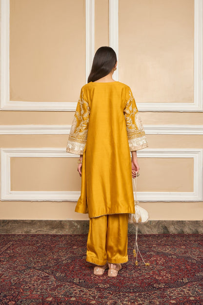 Shraddha Gurung in Mohsina - Glaze Mustard Short Kalidaar Choga with Salwar